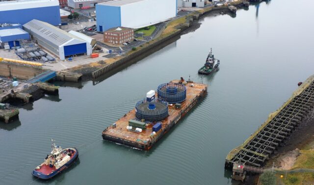 Osprey Intrepid barge carrying two cable carousels with 70km of cable for Seagreen Windfarm into the Port of Blyth.
