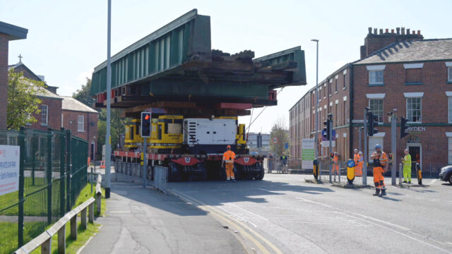 Network Rail Bridge being moved through a residential Street on Osprey SPMTs